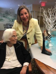 A resident and her daughter enjoying themselves at the "Breakfast at Tiffany's" event