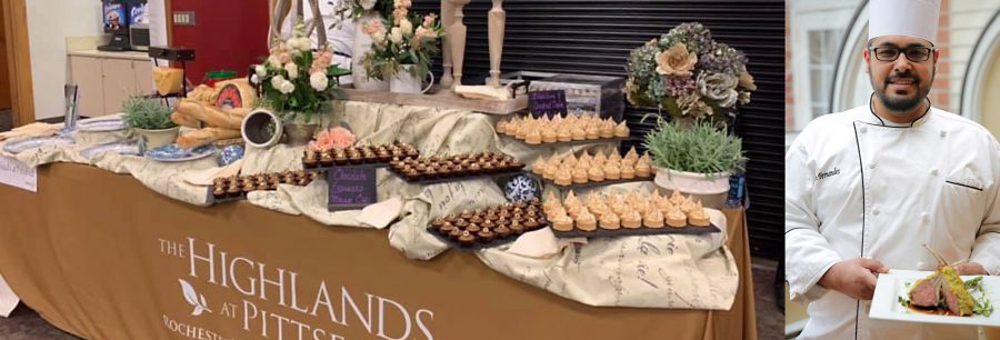 Catered food table and the chef