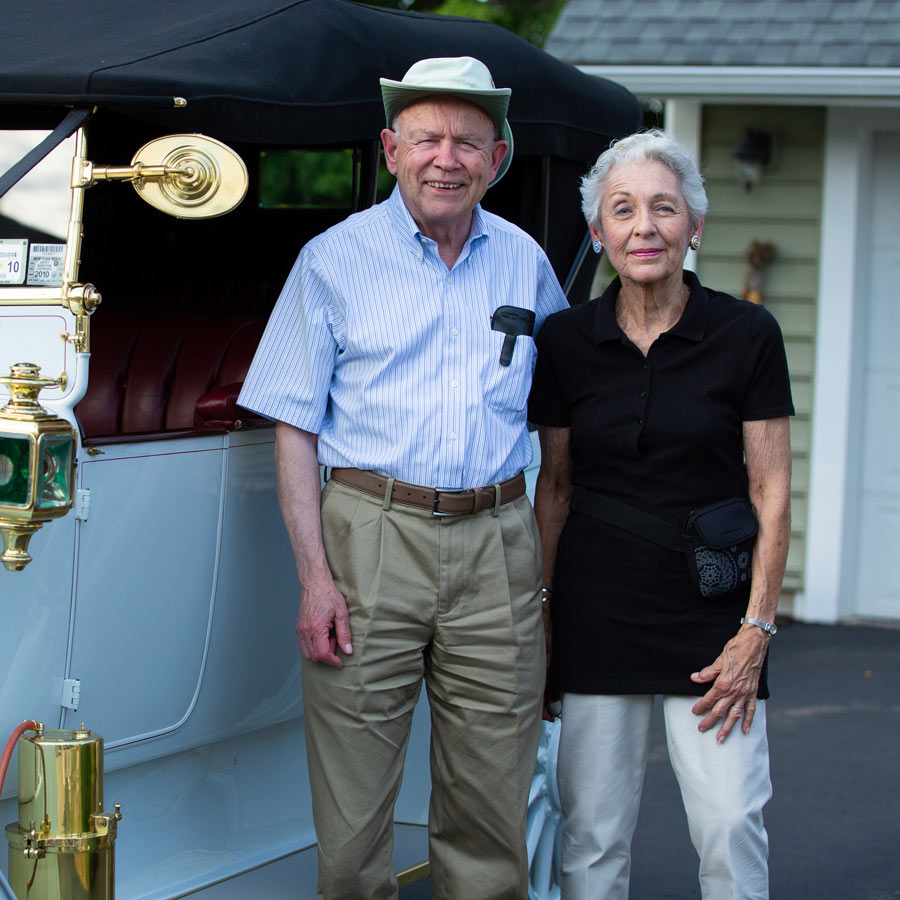 Couple with vintage car