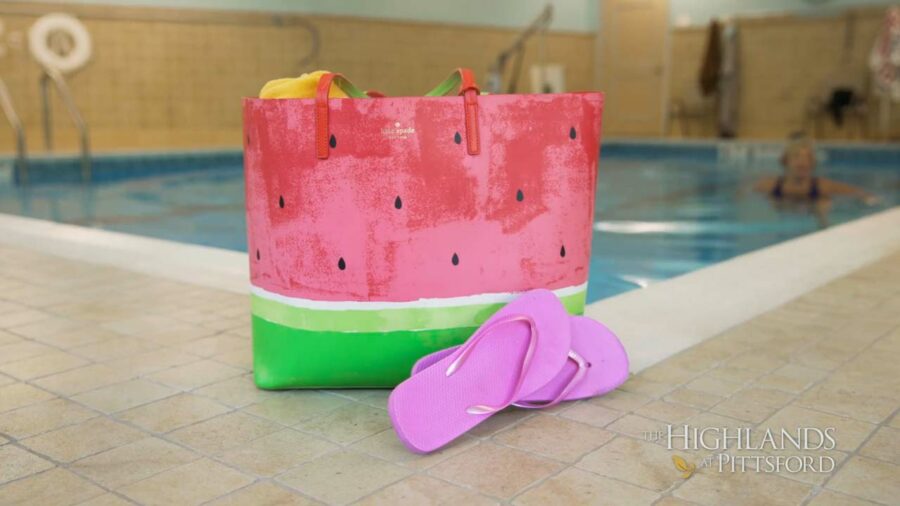 Bag and sandals by the pool