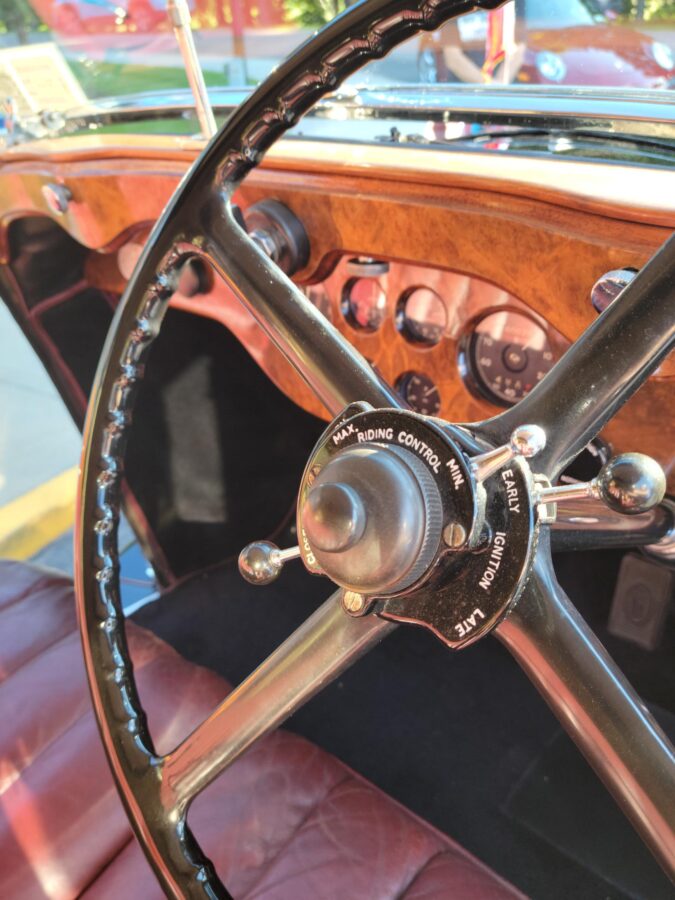 Close up of steering wheel on a classic car