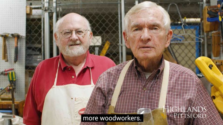 Two senior men in a wood shop